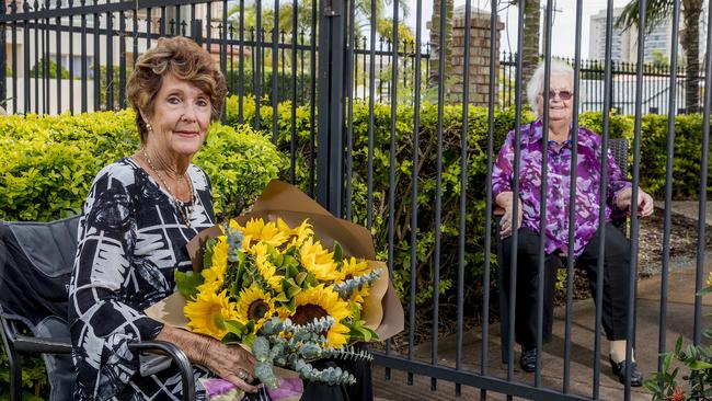 Jan Sugg visiting her mother Beryl Wilesmith, 95, at Opal Kirra Beach Aged Care. Picture: Jerad Williams