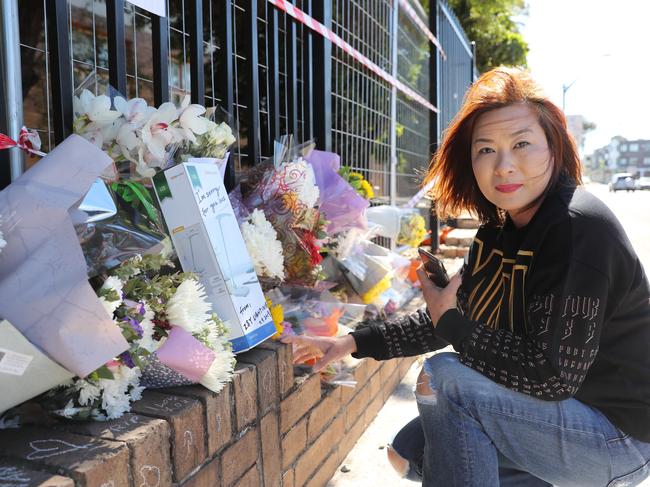 Local business owner Cathy Jin at the scene of a car crash outside Hurstville Public School, where a 12 year old boy died yesterday morning.