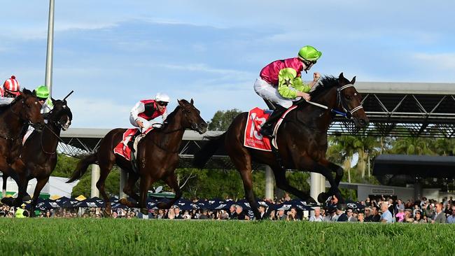 Knight's Choice wins the Group 3 Winx Guineas on the Sunshine Coast for trainers Sheila Laxon and John Symons and apprentice jockey Jaden Lloyd. Picture: Grant Peters-Trackside Photography