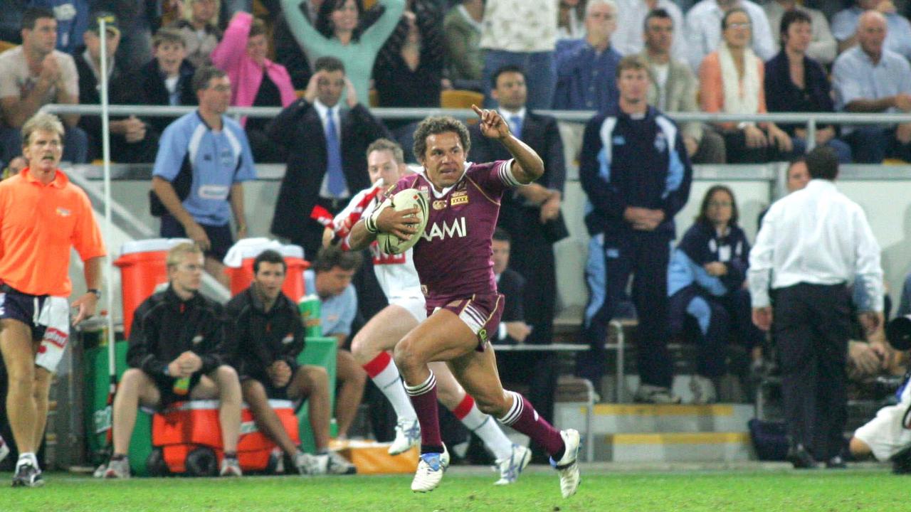 ORIGIN HISTORY 25 May 2005 State of ORigin Game One Queensland vs NSW at Suncorp Stadium - Matt Bowen raises his finger on his way to scoring the match winning try in extra time. PicNathan/Richter sport rugby league action crowd