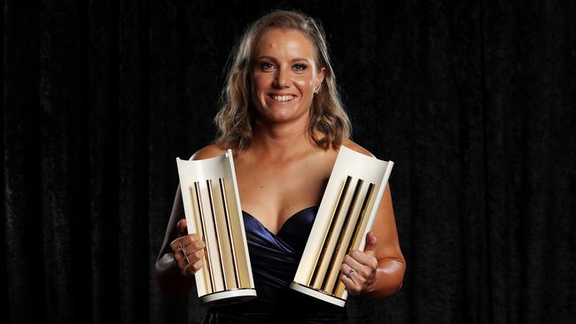 Alyssa Healy poses with her Australian women's ODI and T20I Player of the Year awards at Crown Palladium in Melbourne on Monday night. Picture: Graham Denholm/Getty Images