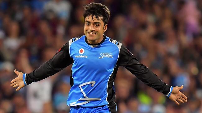 Rashid Khan celebrates taking another wicket for the Adelaide Strikers.