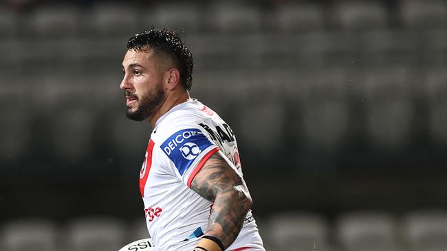 SYDNEY, AUSTRALIA - JUNE 03: Jack Bird of the Dragons makes a break on his way to scoring during the round 13 NRL match between the St George Illawarra Dragons and the Brisbane Broncos at Netstrata Jubilee Stadium on June 03, 2021, in Sydney, Australia. (Photo by Cameron Spencer/Getty Images)