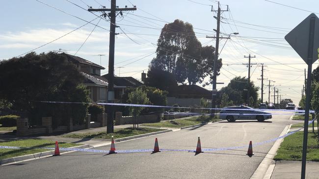 Police cordoned off Alexander Ave in Thomastown after a man was injured with a machete. Picture: Anthony Piovesan