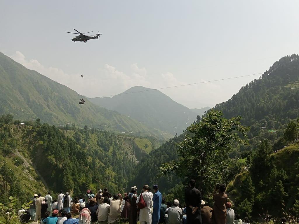 Anxious bystanders watched as the dramatic rescue unfolded. Picture: AFP