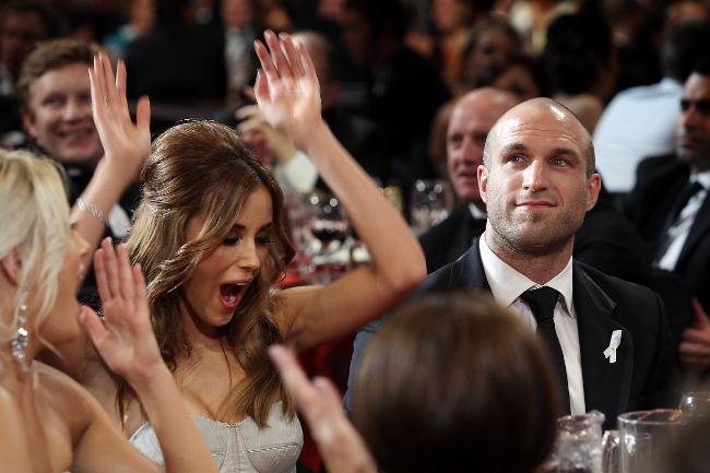 <p>Rebecca Twigley cheers as Chris Judd wins the 2010 Brownlow Medal. Picture: Michael Klein</p>