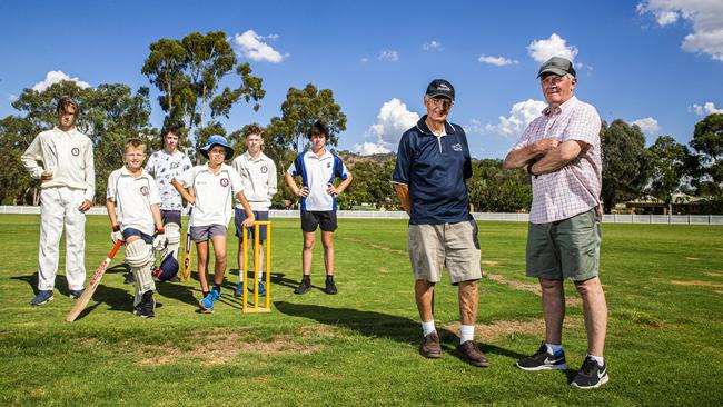 After a huge fundraising effort and plenty of hard work, Peter Morley, right, and Rob Asquith with members of the club’s junior cricket squad are ready to take on all-comers at the rejuvenated Friendlies ground. Picture: Aaron Francis