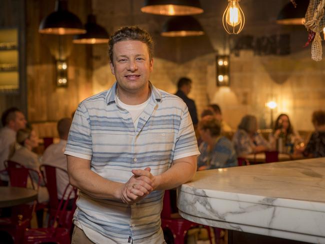 Jamie Oliver in his Brisbane restaurant. The celebrity chef says he’s saddened by the collapse of his Jamie’s Italian empire. Picture: Peter Wallis