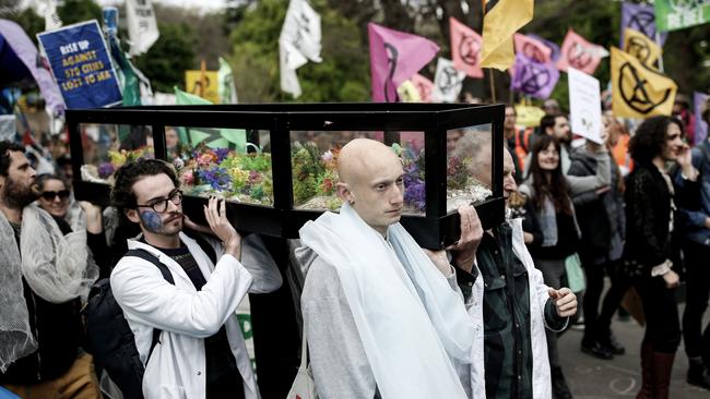 Protesters with a casket at Monday’s demonstration. Picture: Darrian Traynor/Getty Images