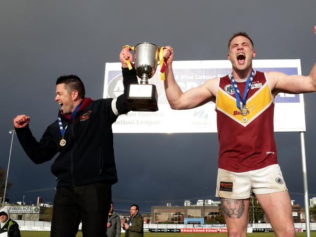 Lower Plenty coach Ben Turner and Captain Patrick Flynn celebrate after the NFL Division 2 grand final.