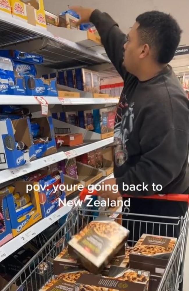 A New Zealand man has shared a video of himself buying loads of Coles Ultimate Chocolate Chip cookies to take home. Picture: TikTok/@natnmj