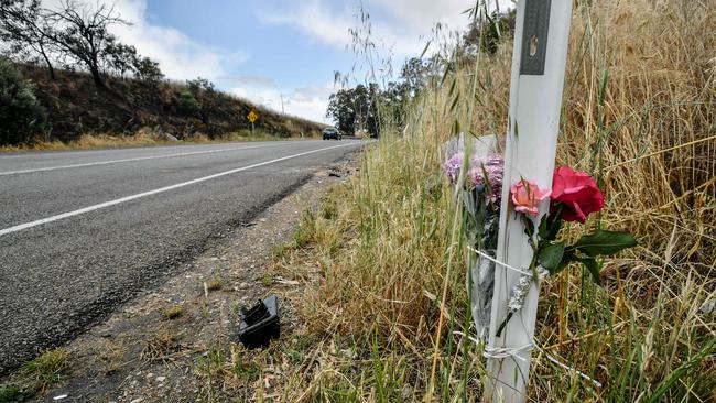 A tribute of tlowers left on Long Valley Rd where teenage sweethearts Hayden Perkins and Mikayla Eastwood died in the Adelaide Hills in November. Picture: AAP / Morgan Sette