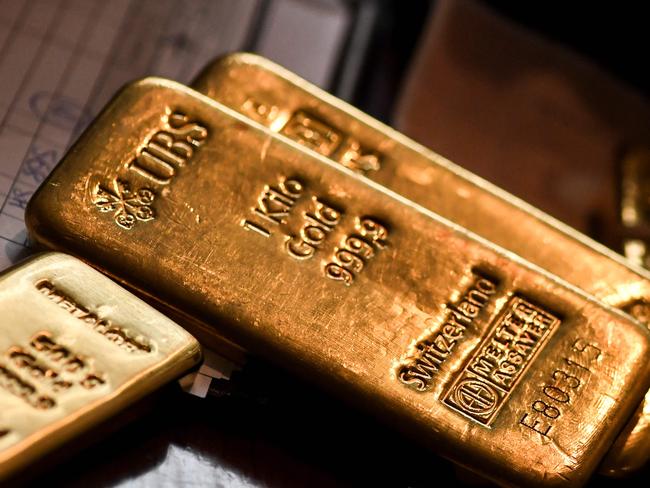 Gold bars are pictured at the Godot and sons gold buyer store on July 29, 2020 in Paris. (Photo by ALAIN JOCARD / AFP)