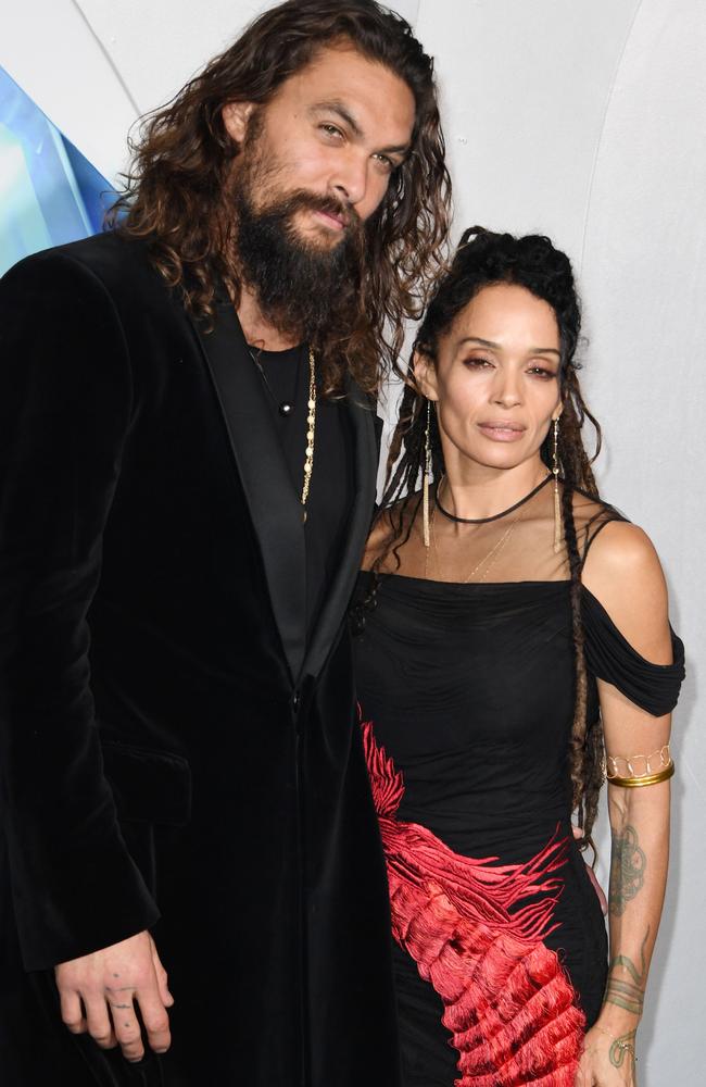 Jason Momoa and his wife Lisa Bonet dressed Boho chic in black for Aquaman. Picture: AFP 