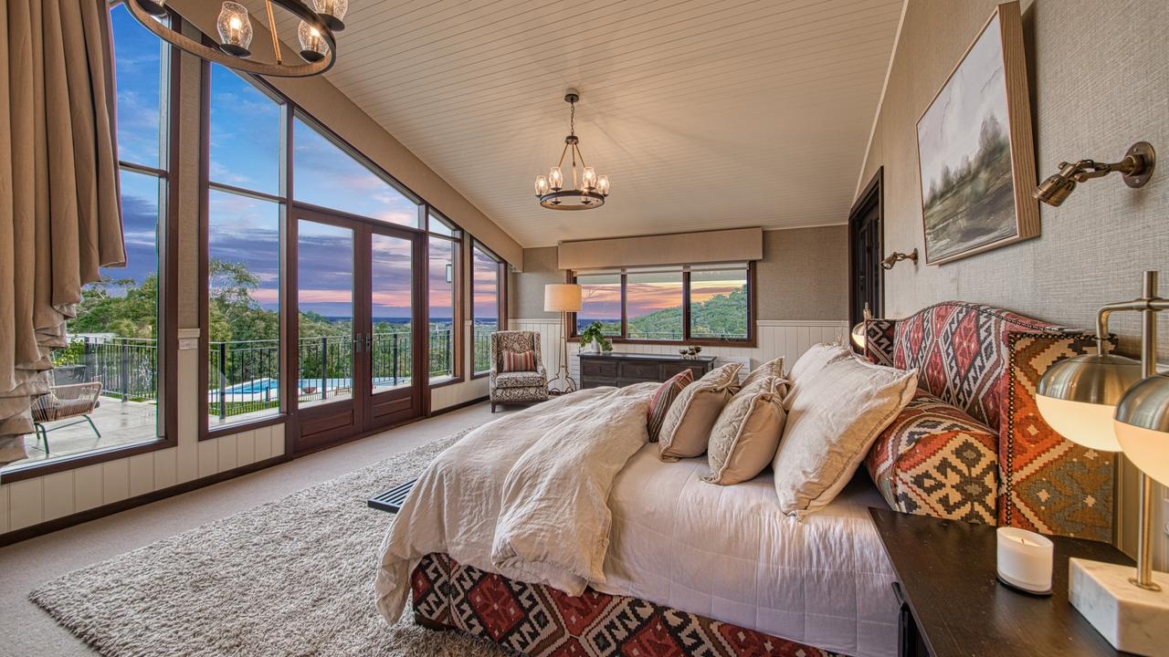 The main bedroom with a private wraparound balcony.