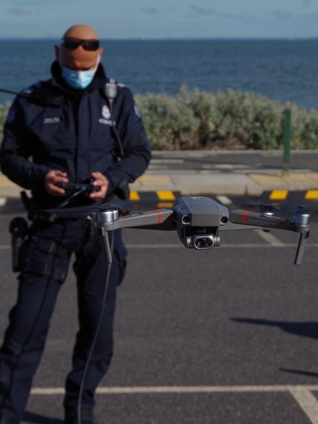 Leading Senior Constable Ruben Gilles piloting the new drone during a test flight at St Kilda Marina on August 13. Picture: Cheney Dodson