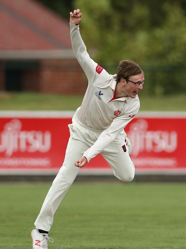 Liam Bowe chases a wicket for Essendon on a rain-delayed Saturday. Picture: Hamish Blair