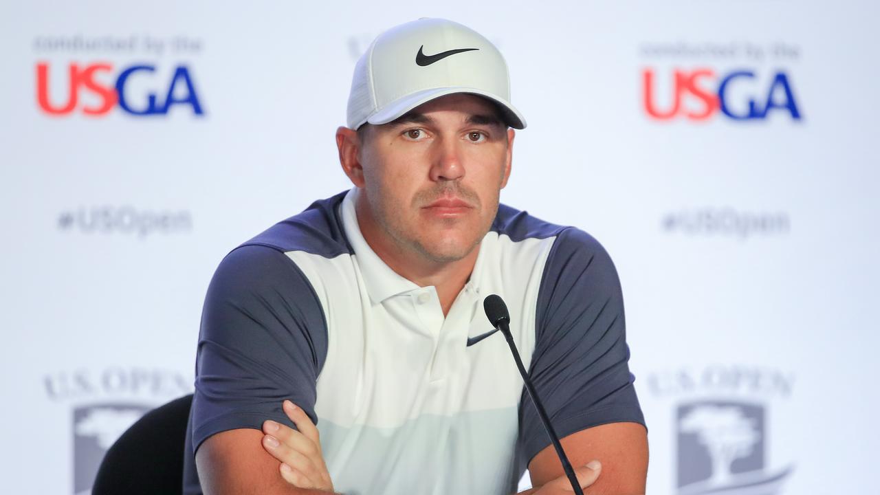 Brooks Koepka speaks to the media during a press conference prior to the 2019 U.S. Open.