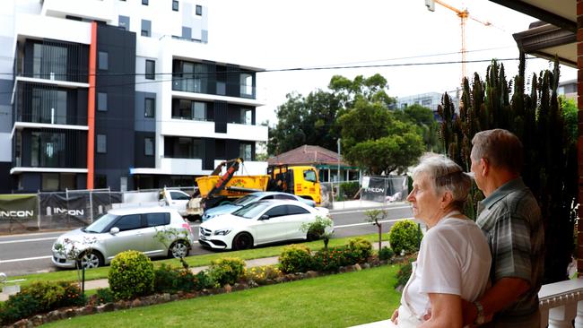 Kakica and Ivan Adin survey the multi-storey units that dominate the opposite side of Veron St. Picture: Angelo Velardo