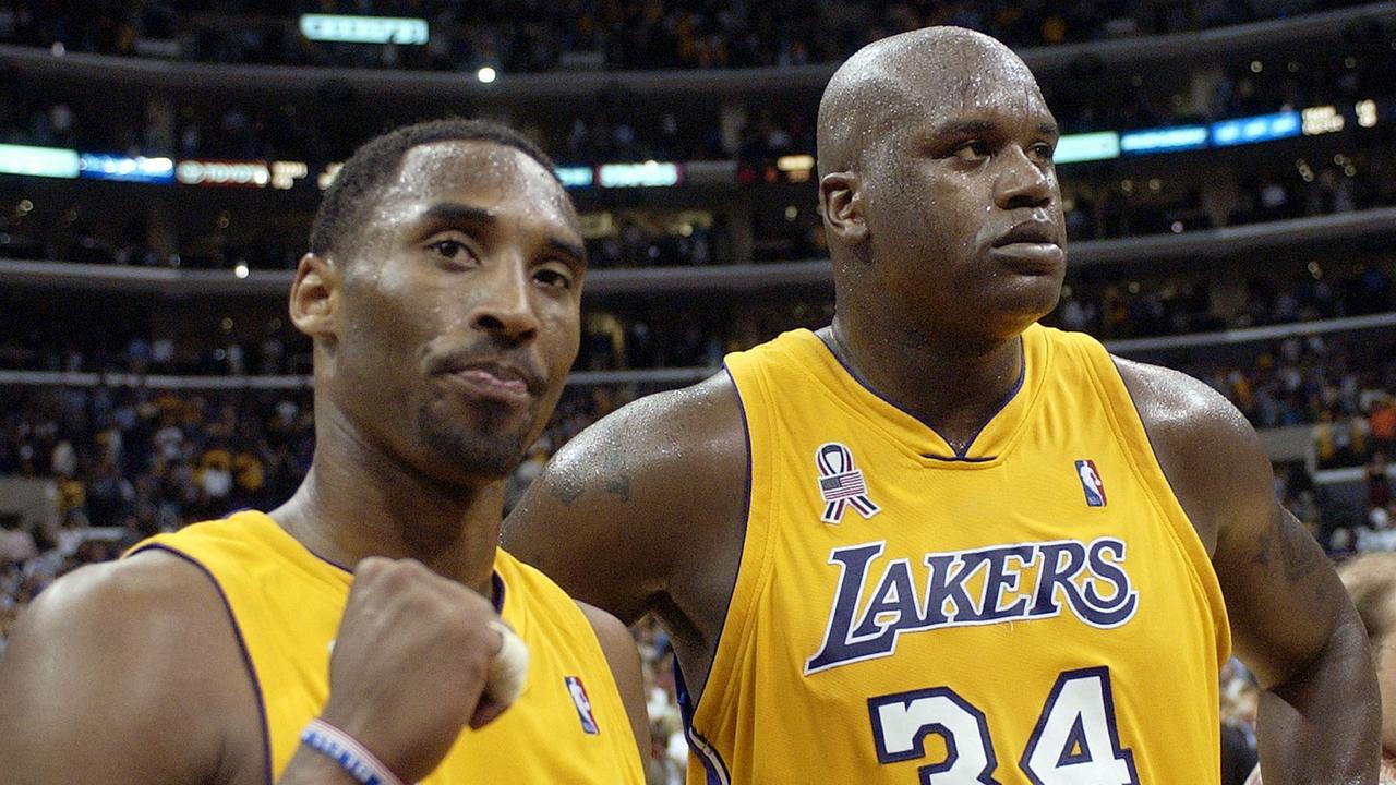 Shaq tried to prevent Kobe from hogging the ball.