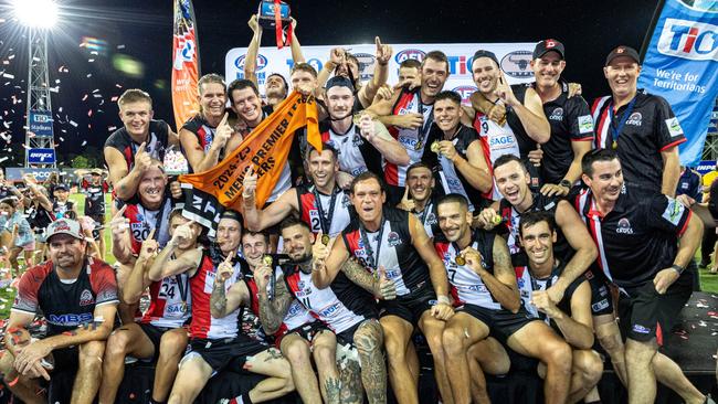 Southern Districts celebrate their 2024-25 NTFL grand final win against St Mary's. PIcture: Pema Tamang Pakhrin