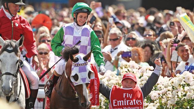 Jockey Michelle Payne celebrates with brother and strapper Stevie Payne after Prince Of Penzance’s 2015 Melbourne Cup win. Picture: Getty Images