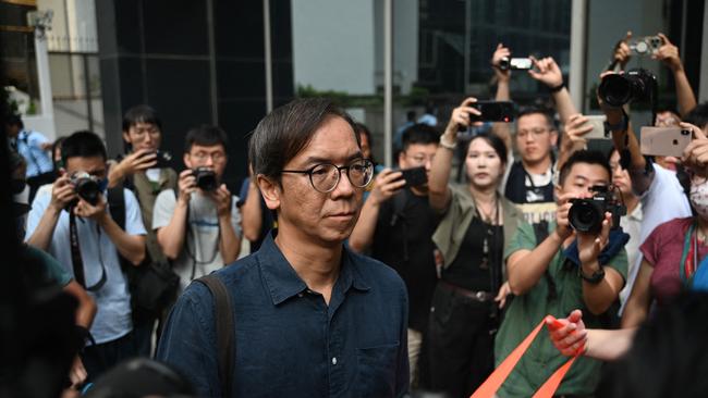 Chung Pui-kuen leaves the district court in Hong Kong on Thursday. Picture: AFP