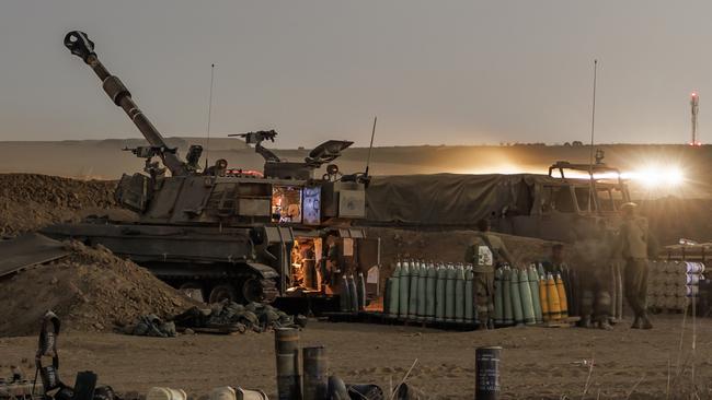 Mobile artillery of the IDF prepares to fire towards the Gaza strip on October 30. Picture: Getty Images