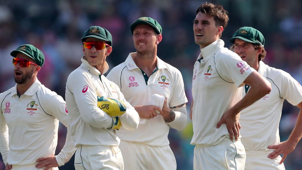 Matthew Wade, Tim Paine, James Pattinson, Pat Cummins and Joe Burns. Picture: AFP Photo