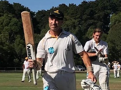 Justin Whitcher celebrates his club record double-ton for Heidelberg on Saturday. Picture: Supplied