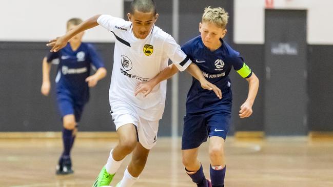 Victorian U12 Jordy Vonja (right) named among top performers from Futsal Nationals.