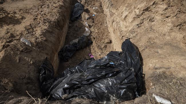 Bodies inside a mass grave in Bucha, Ukraine.