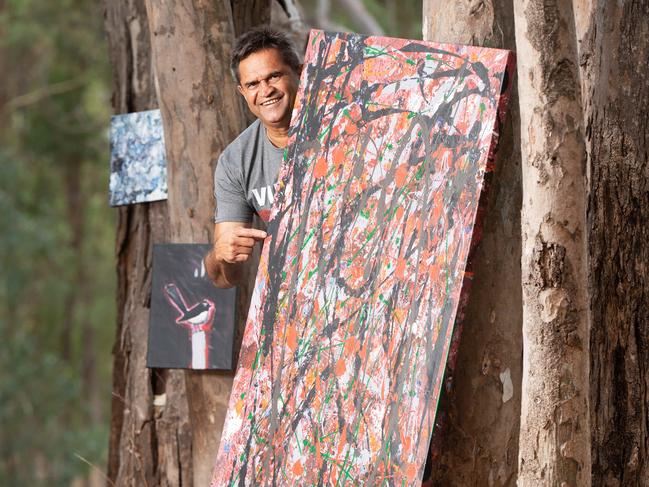 Nicky Winmar with some of his recent art work. Picture: Rob Leeson