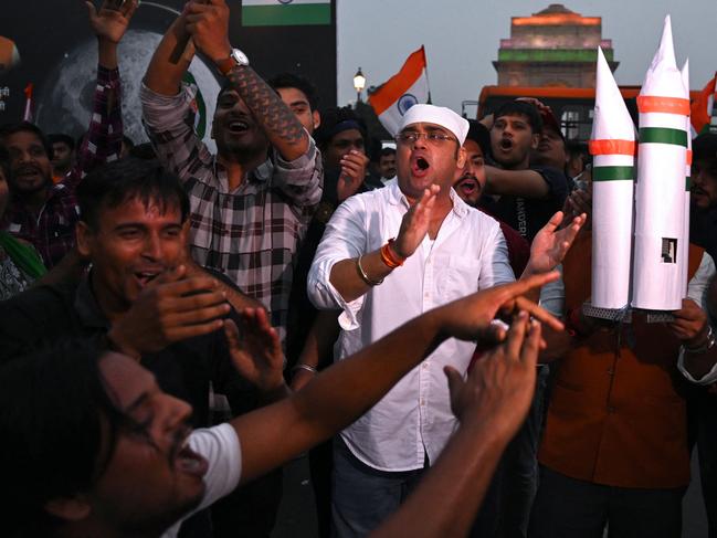 People in New Delhi celebrate the successful lunar landing of Chandrayaan-3 spacecraft on the south pole of the moon. Picture: AFP