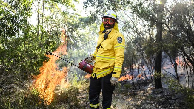 New NSW RFS member Issac Delix taking part in the Canoelands backburn. Picture: Darren Leigh Roberts