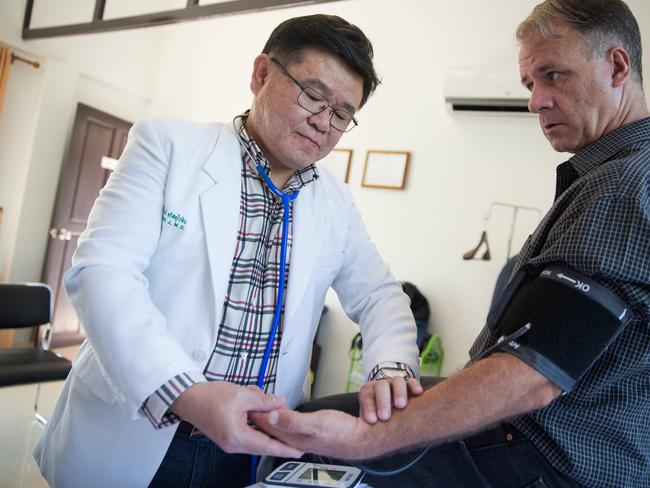 A doctor treats a rehab inpatient at The Dawn. Picture: Supplied