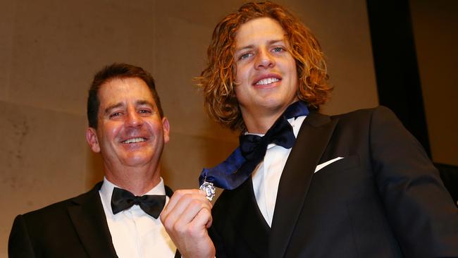 Nat Fyfe wins the Brownlow with coach Ross Lyon. Melbourne. 28th September 2015. Picture: Colleen Petch.