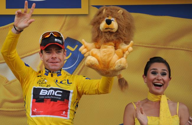 The Territory’s Cadel Evans saluted at the Tour de France but was nah mated by Morris. Picture: AFP PHOTO/PASCAL PAVANI