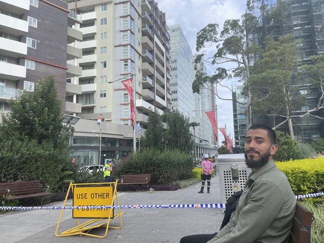 Jareer Shikrani at Burwood where he and hundreds of other residents have been evacuated after parts of the building collapsed across the road at Railway Pde.