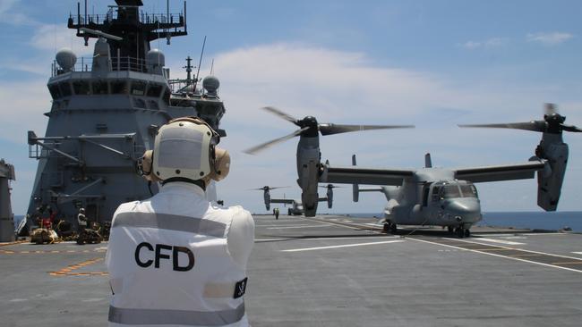 US Marine Corps Osprey MV-22B on the flight deck of HMAS Canberra preparing to take off for operations about the South China Sea. Picture: Charles Miranda