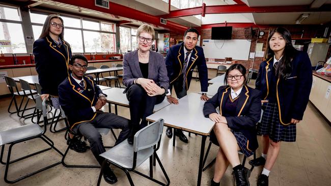 Caroline Milburn with Sunshine College Ardeer campus students (from left) Rosie-Star Forsberg, Ahmed Hassan, Ali Hussain, Dinh Duon and Tianna Tran. Picture: Nicole Cleary