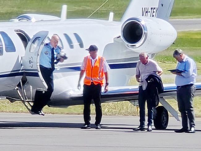 Police Minister Mark Ryan and Police Commissioner Steve Gollschewski at Hervey Bay Airport.