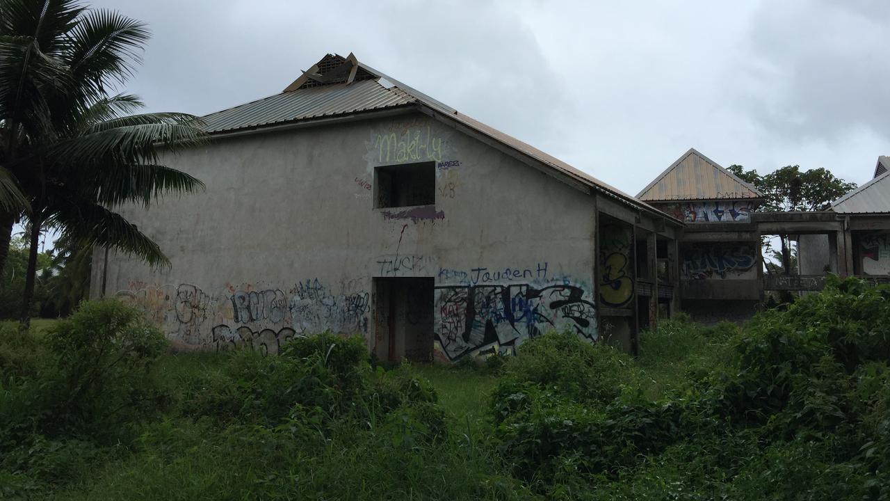 Some of the buildings are now covered in graffiti