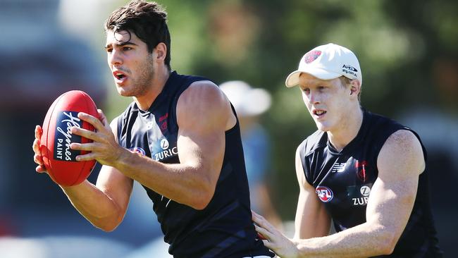 Christian Petracca marks the ball ahead of Clayton Oliver during a Melbourne preseason session. Could he be in for a breakout SuperCoach year? Picture: Michael Dodge/Getty Images