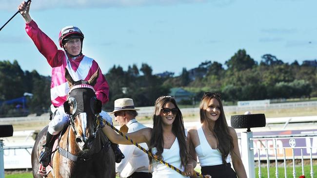  Elite Belle (7) ridden by William Pike, takes out the Carlton Draught-Railway Stakes. Escorted in by the grand daughters of ...