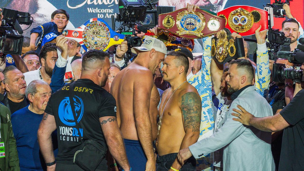 Fury and Usyk face off for the final time prior to their fight on Sunday. (Photo by Yasser al-UMARI / AFP)