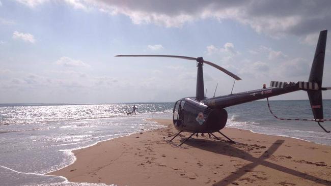 Helibrook chopper VH-MEB on a Northern Territory beach before it went underwater