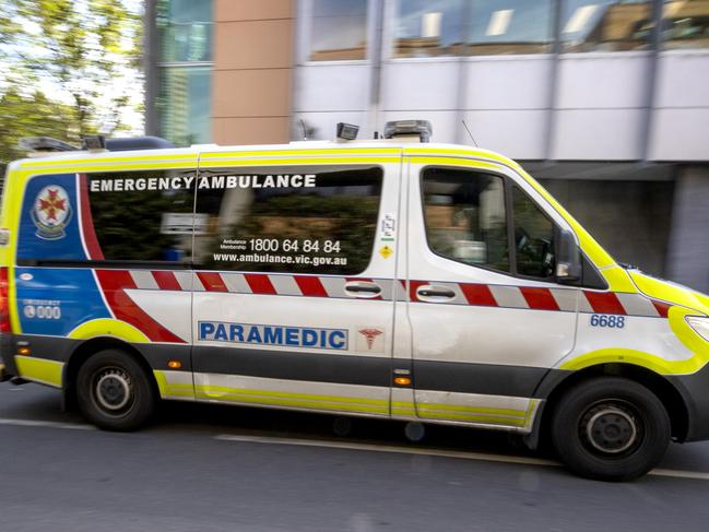 MELBOURNE, AUSTRALIA - NewsWire Photos October 8, 2021:  An Ambulances at St Vincent's Hospital in Melbourne.The Australian Defence Force, State Emergency Service and St Johns personnel will start driving ambulances in Victoria due to a surge in demand over the past two weeks.Picture: NCA NewsWire / David Geraghty