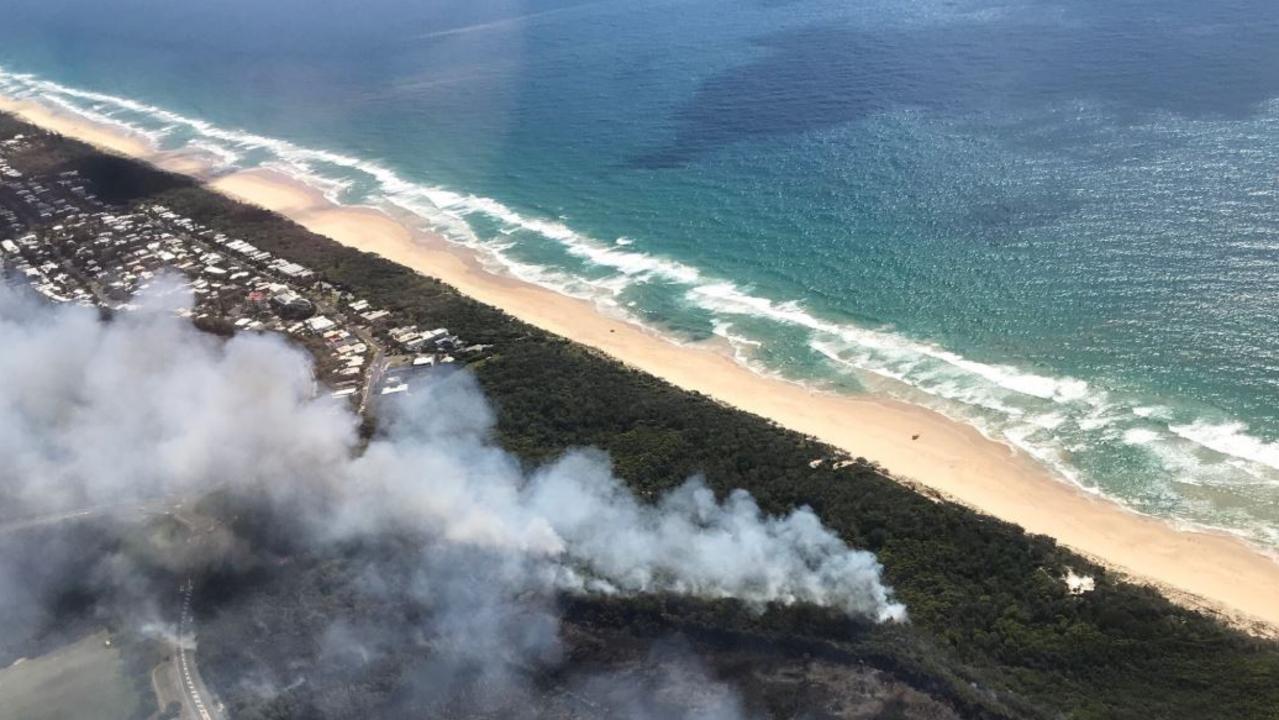 Aerial footage shows the extent of the Peregian Beach bushfires on Wednesday, Oct 23.