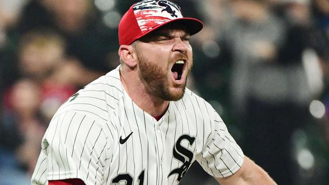 CHICAGO, ILLINOIS - JULY 04: Liam Hendriks #31 of the Chicago White Sox reacts after striking out a batter in the eighth inning against the Minnesota Twins at Guaranteed Rate Field on July 04, 2022 in Chicago, Illinois.   Quinn Harris/Getty Images/AFP == FOR NEWSPAPERS, INTERNET, TELCOS & TELEVISION USE ONLY ==